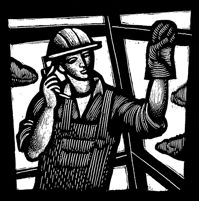 Construction Worker Makes a Call on Telephone