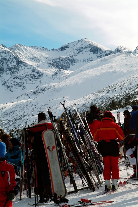 Skiers Take a Break at the Chalet During a Day of Downhill Skiing