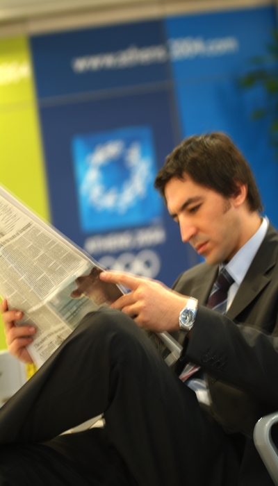 Businessman Reading The Newspaper