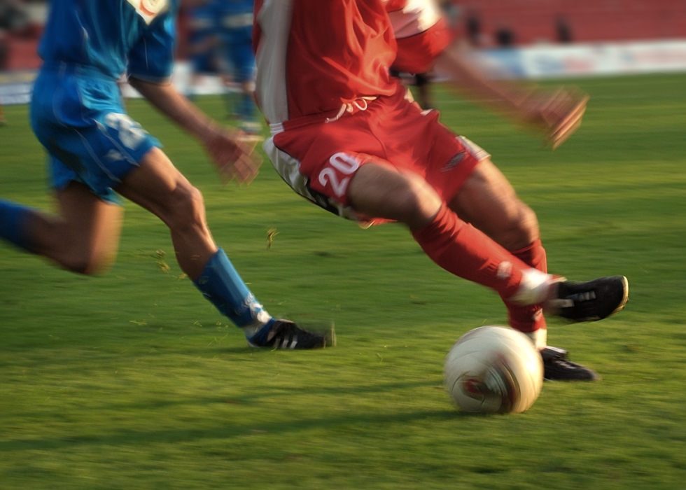 European Football: Soccer Player with Ball