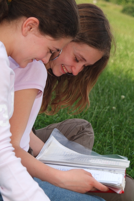 Girls Reading Book in the Park