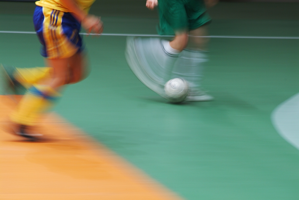 European Football: Soccer Players Run with the Ball