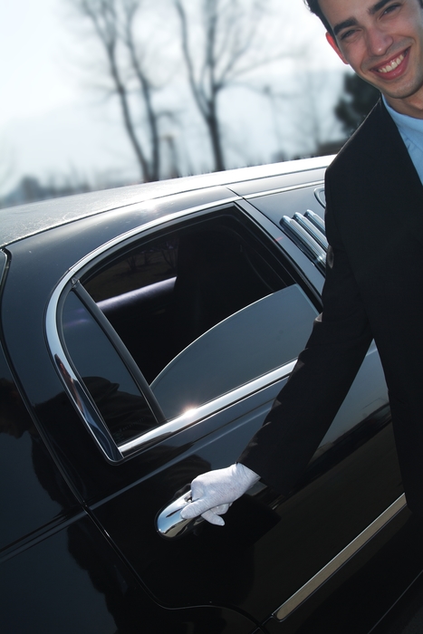 Limousine Driver Opening The Car Door