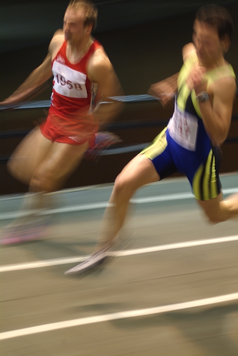 Track and Field: Runners Racing on The Track