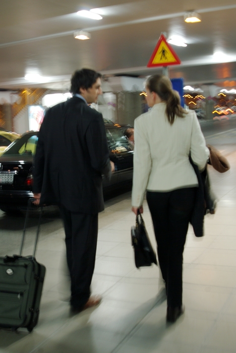 Business People Walking to Their Rented Car