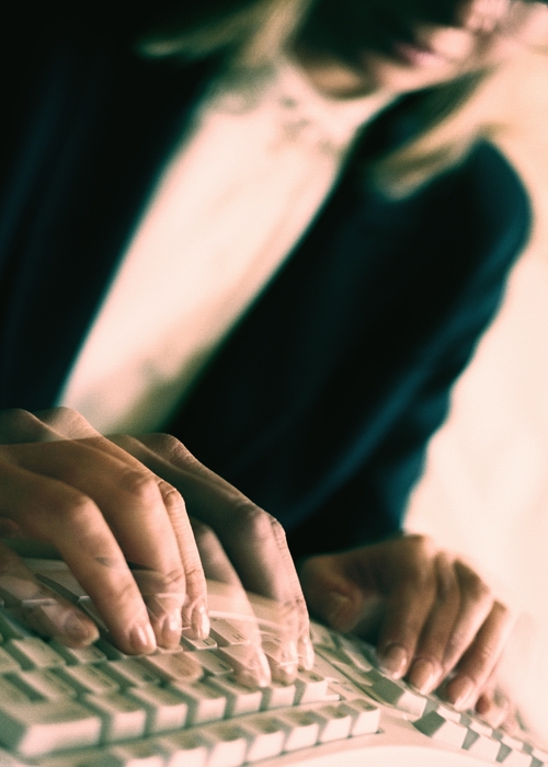 Businesswoman At a Keyboard