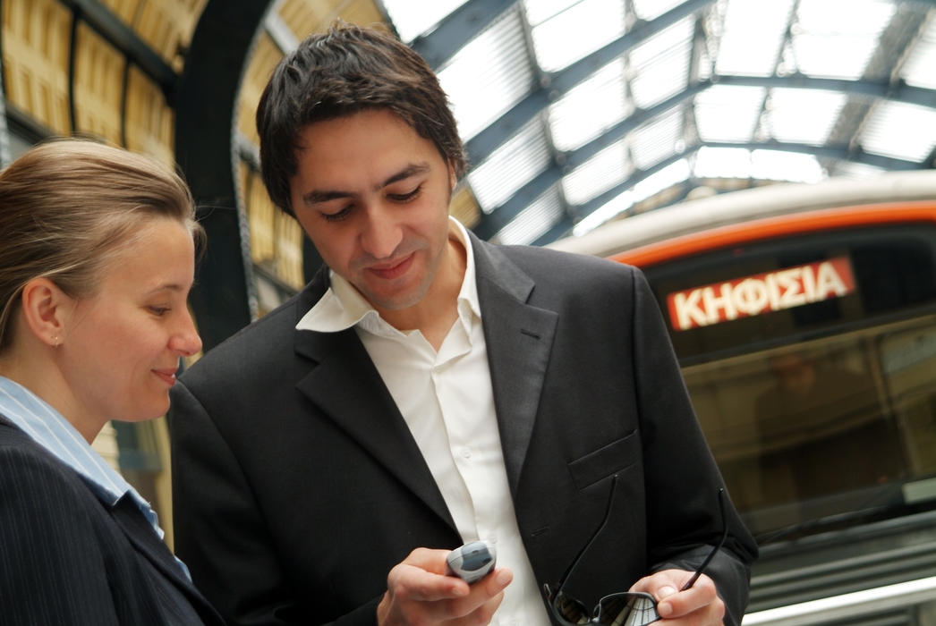 Business People Waiting in a Train Station