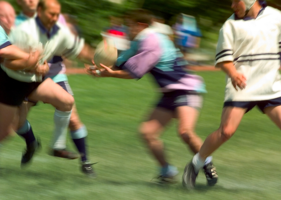 Rugby Player Gets the Ball