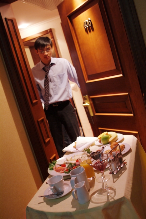 Businessman Retrieving Breakfast