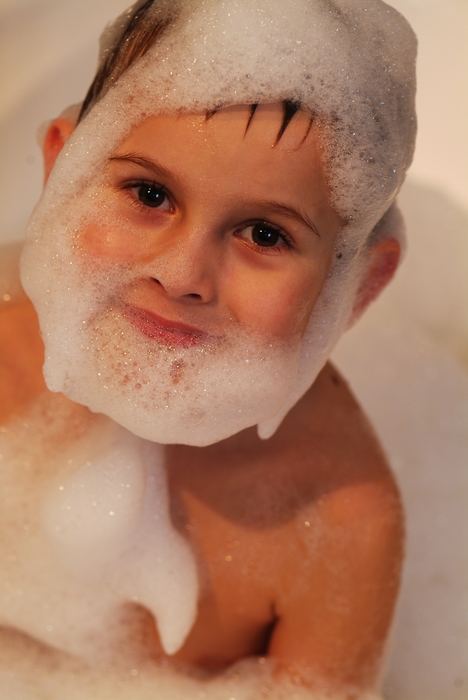 Young Boy with Bubbles in a Bathtub