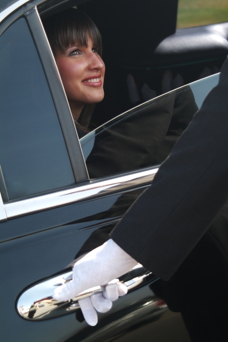 Businesswoman in a Limousine