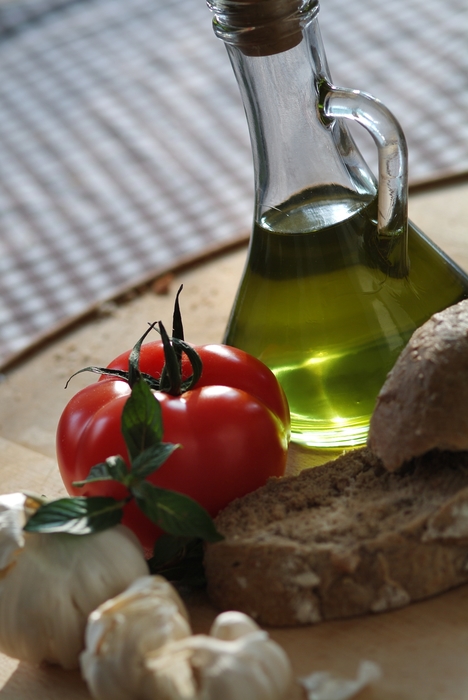 Garlic Cloves, Tomatoes, Olive Oil and Bread