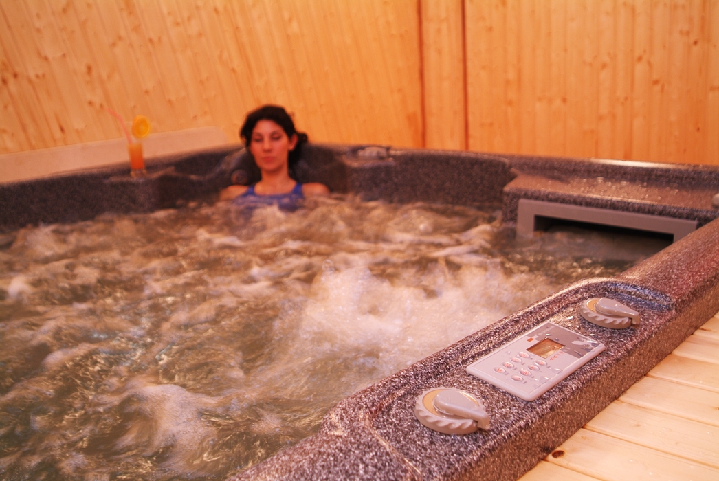 Woman Relaxing in the Whirlpool