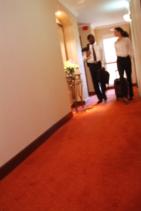 Man & Woman Leaving Their Hotel Rooms