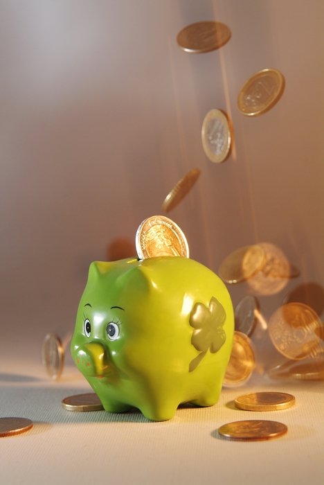 Piggy Bank with Money Coins Falling