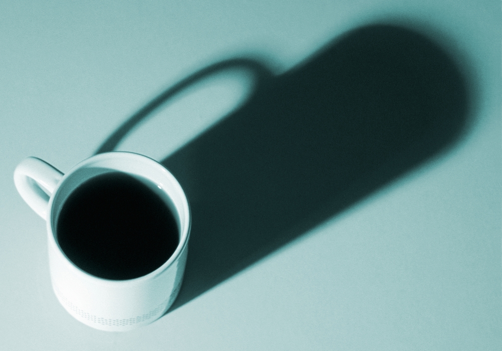 Coffee Cup with Dramatic Shadow