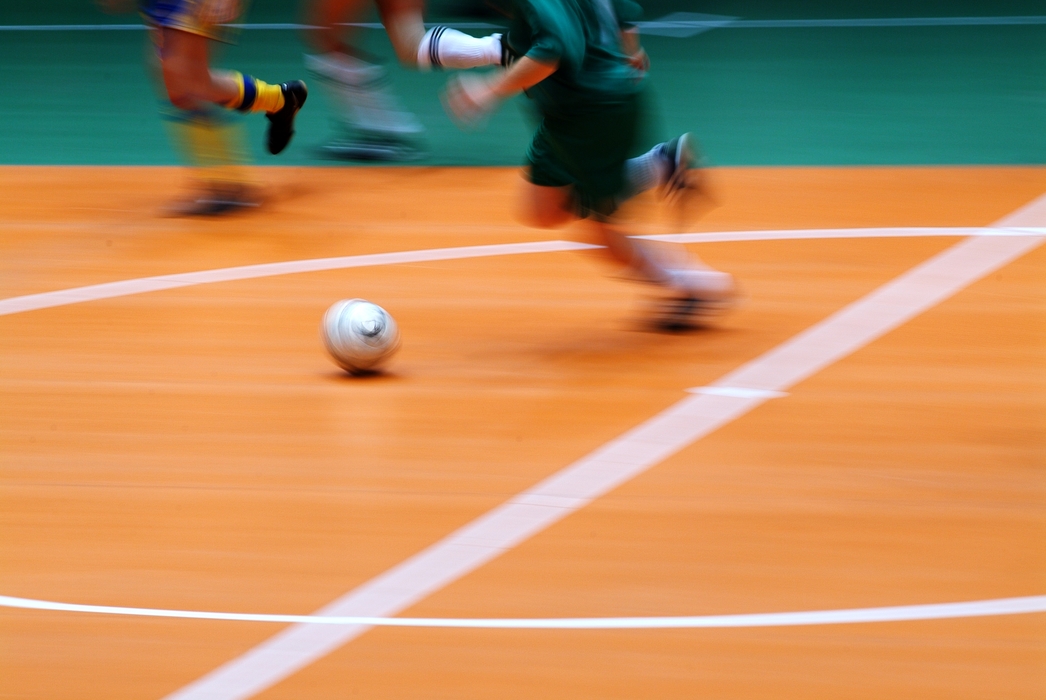 European Football: Soccer Player Running with Ball