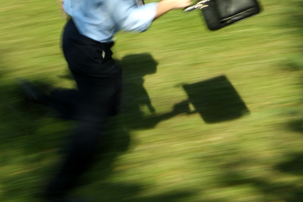 Businessman Running with Briefcase