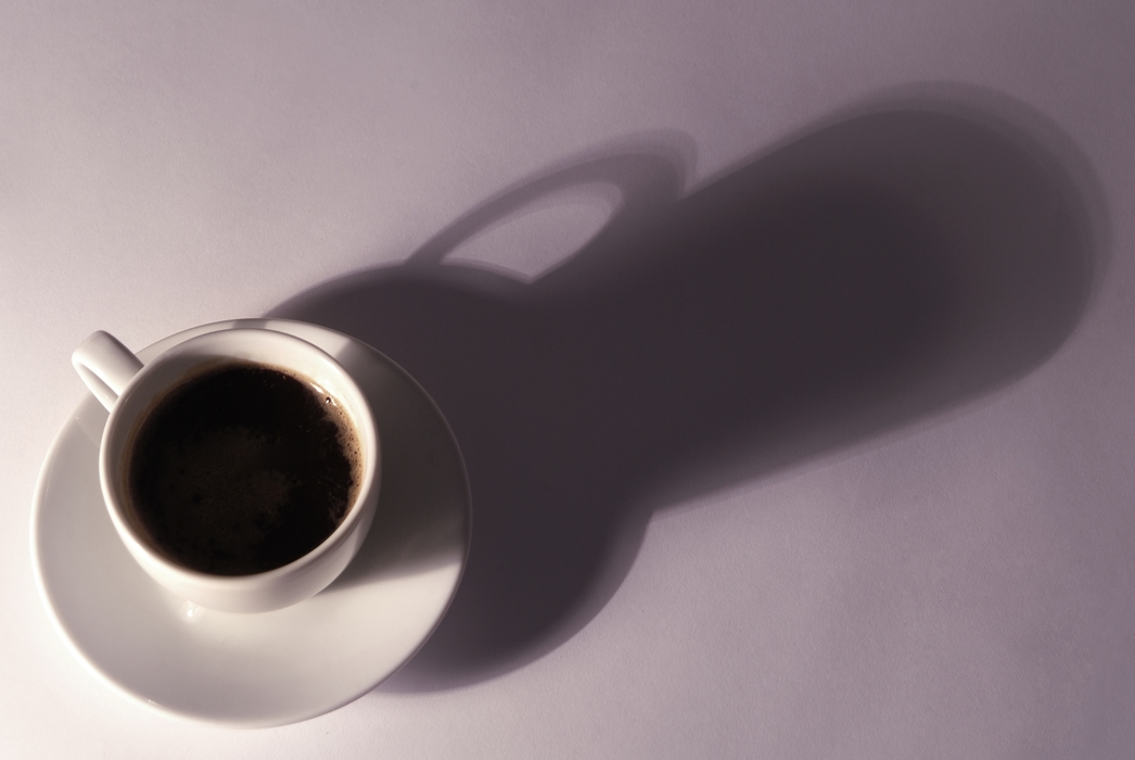 Cup of Coffee with Dramatic Shadow