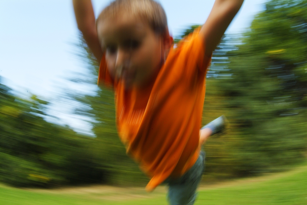 Boy Playing in Park