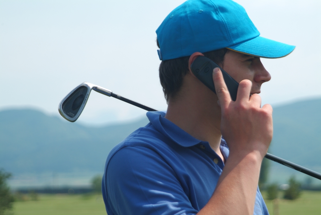 Golfer on Cell Phone