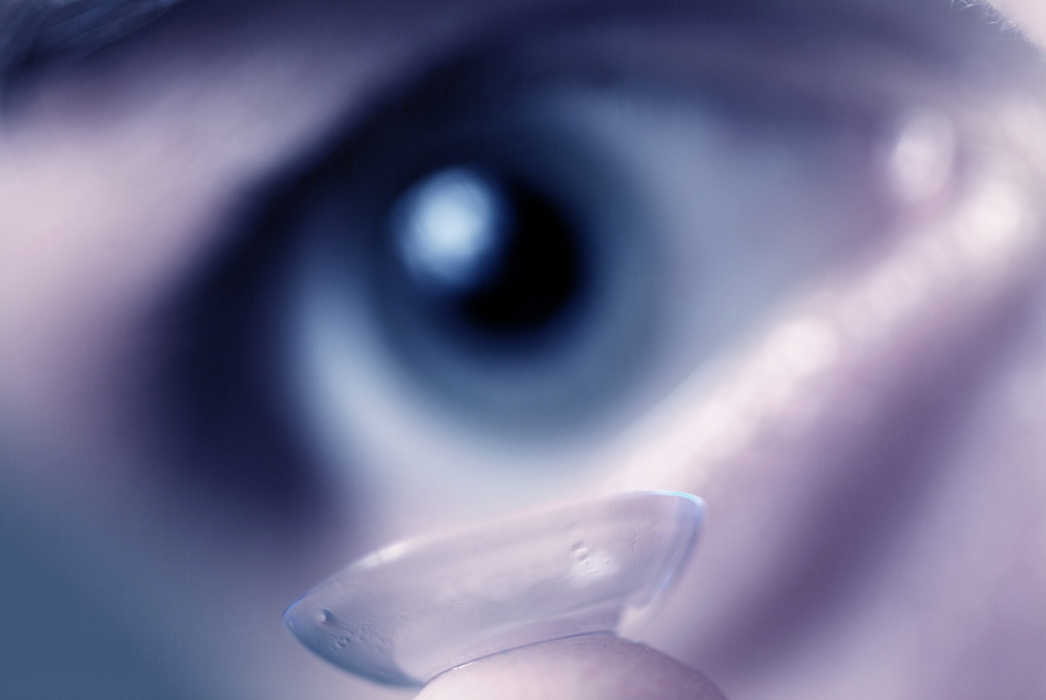 Woman Putting in Contact Lenses