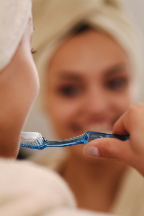 Woman Brushing Her Teeth