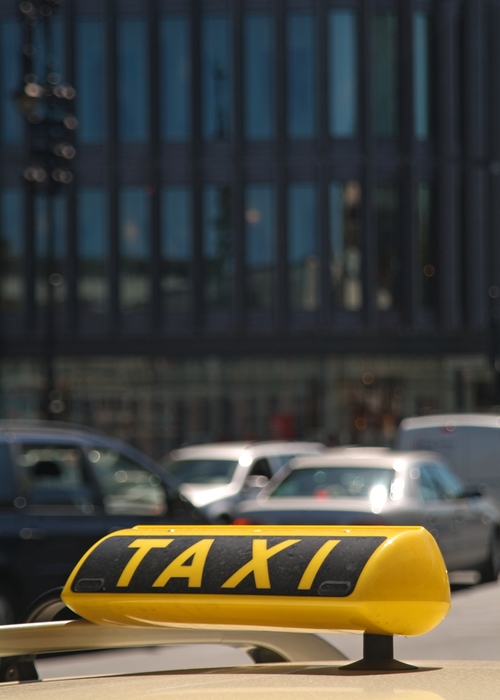 Taxi Cab in Urban Street