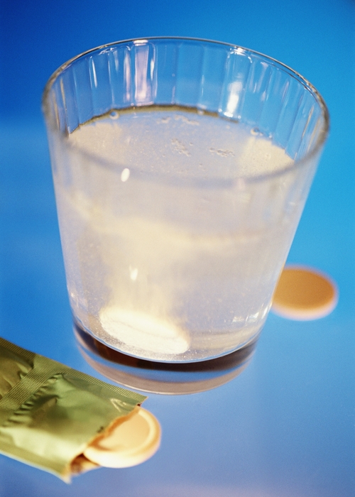 Glass of Water Bubbling with " Alka Seltzer "