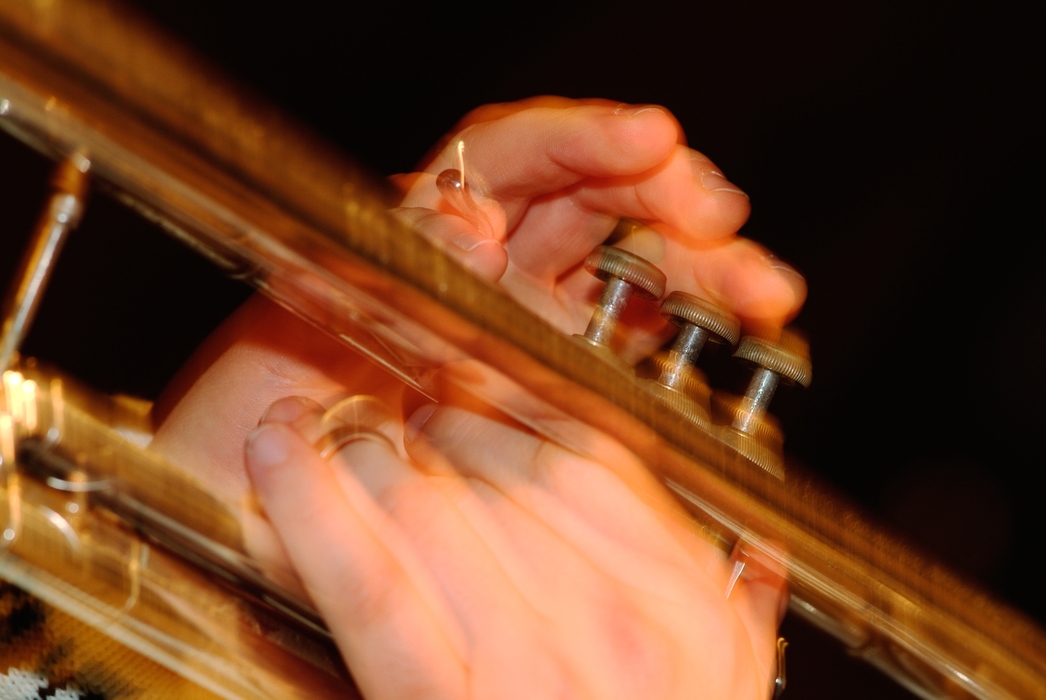 Orchestral Trumpeter Fingers on Buttons