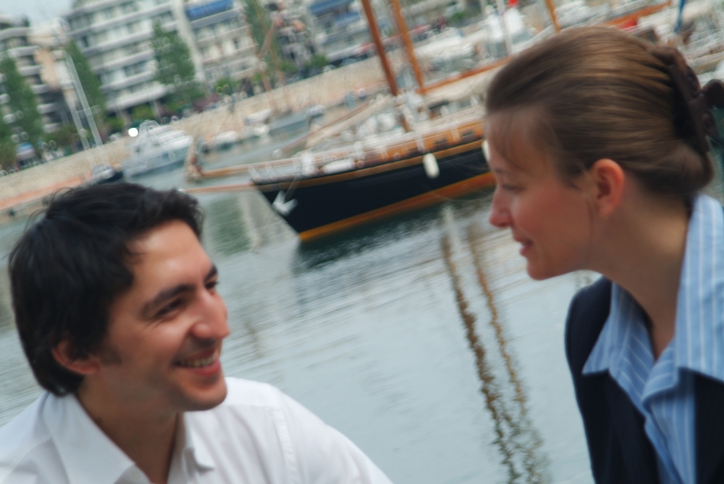 Business People Relaxing By The Harbor