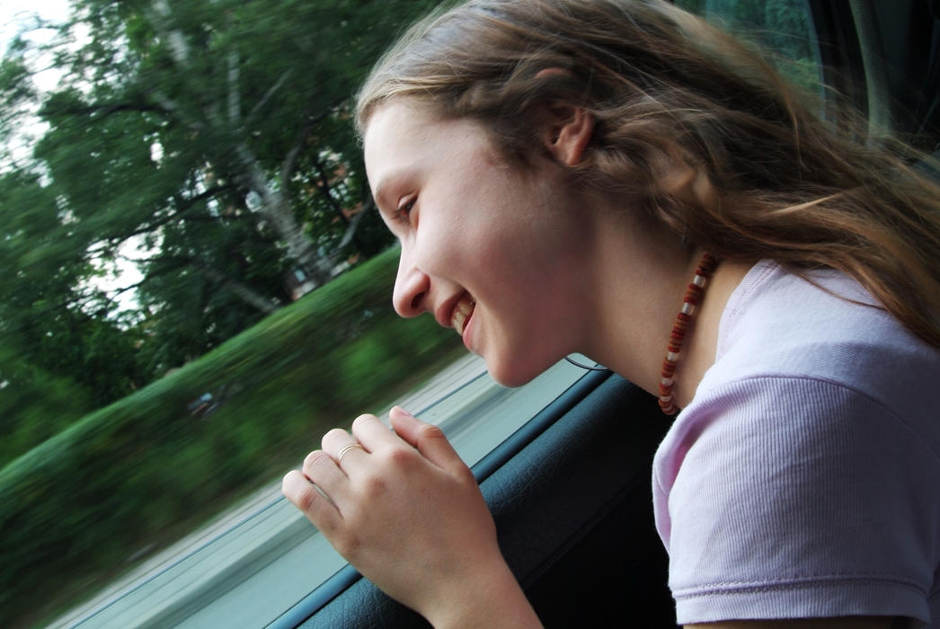 Girl Looking Out a Window