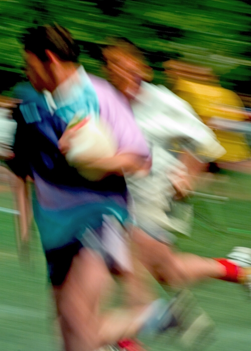 Rugby Player Running with the Ball