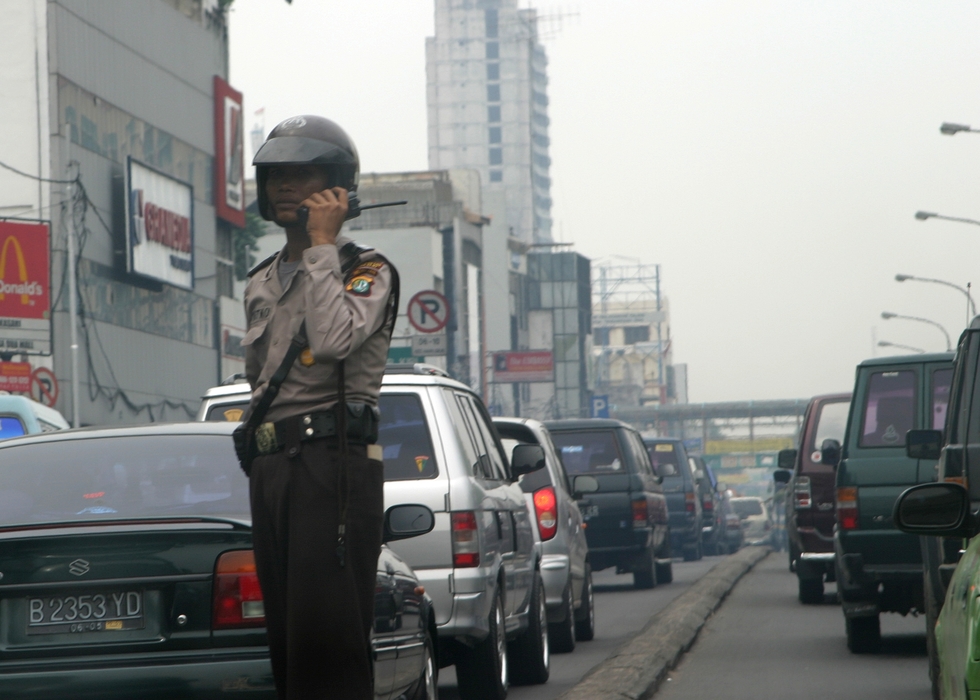 Traffic Cop in Busy Traffic, Bali, Indonesia