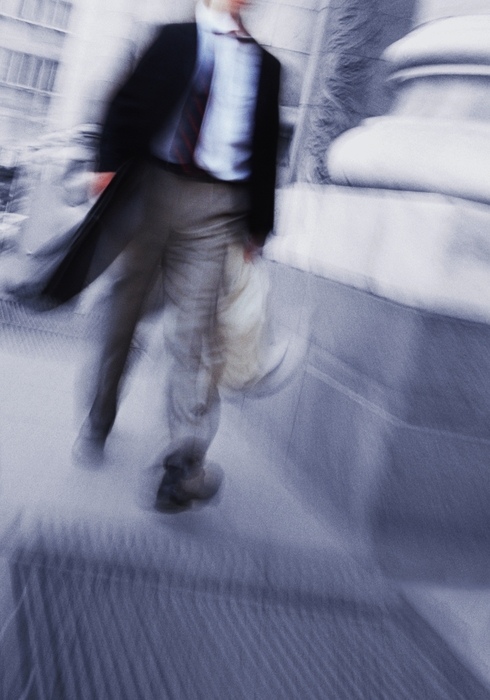 Businessman Walking on The Street