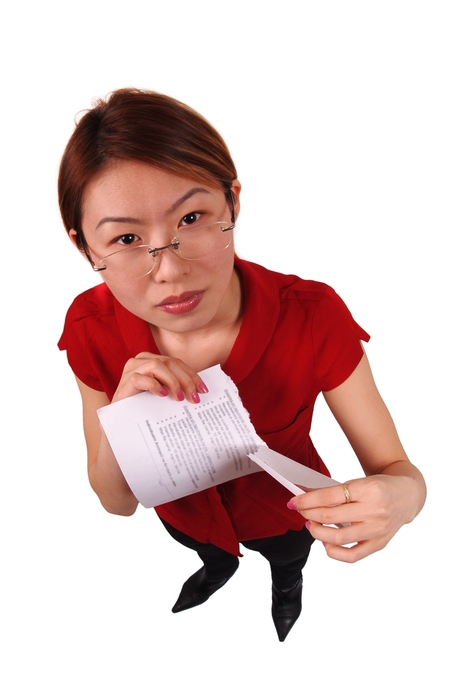 Businesswoman Tearing Paper