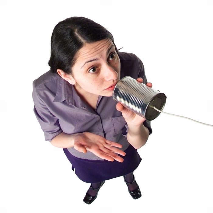 Woman Talking Into a Cup and String