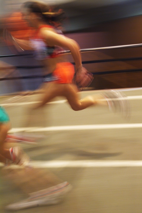 Track and Field: Runners Racing on The Track