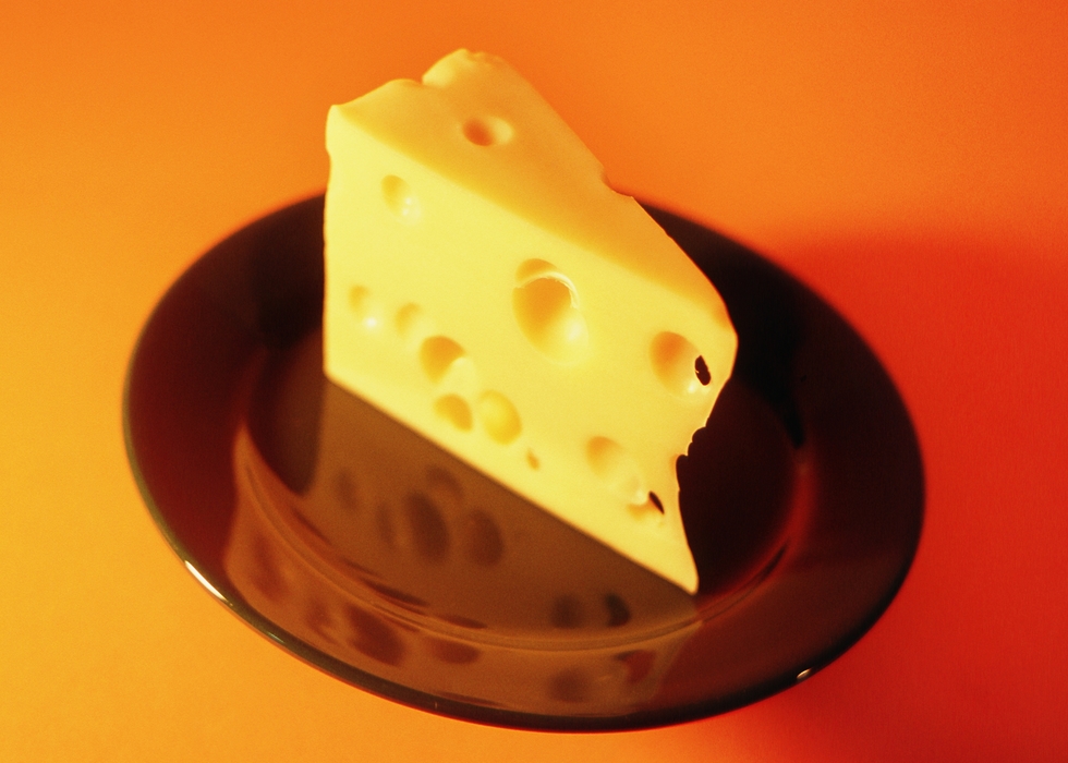 Wedge of Swiss Cheese on a Plate