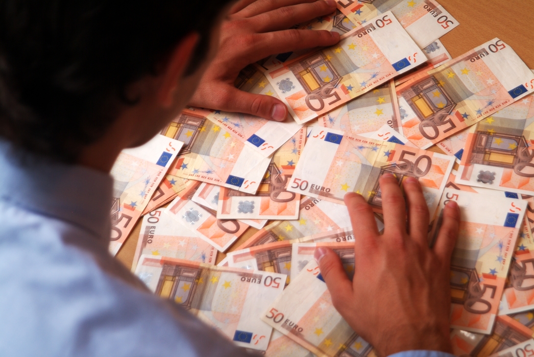 Man Counting Euro Money Bills