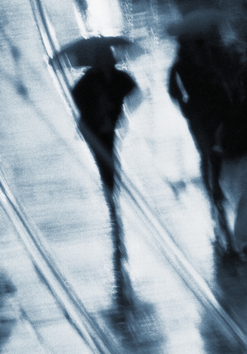 Businesswoman Walking in The Rain