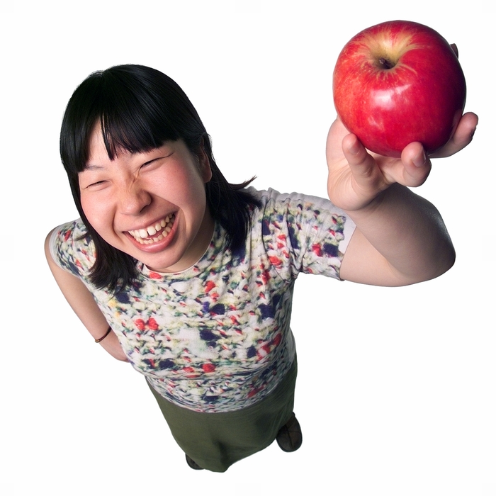 Woman Holding An Apple