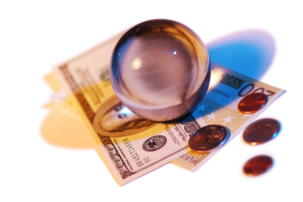 Crystal Ball with U.S. and Euro Dollar and Coins