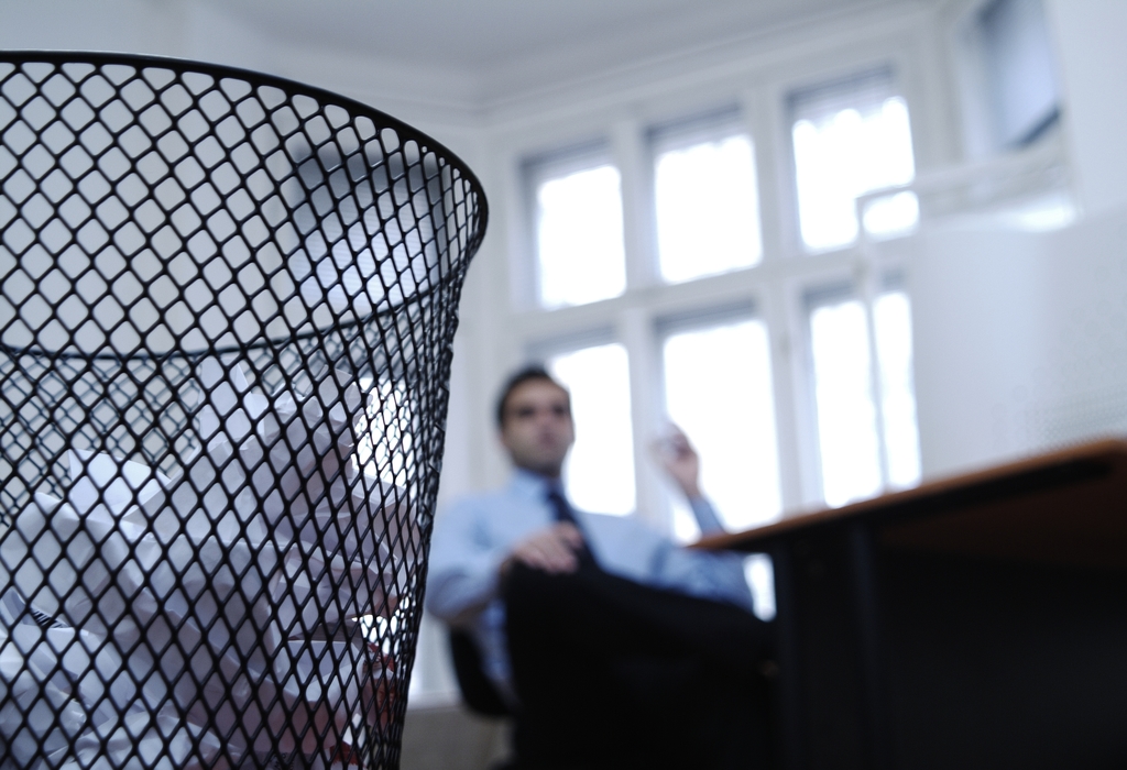 Businessman Relaxing At Desk