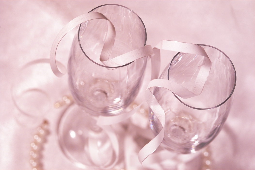 The Wedding Day:  Champagne Glasses with White Ribbons