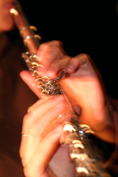 Orchestral Flutist Playing the Keys