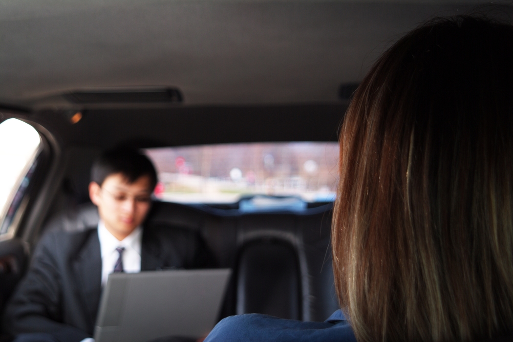 Business People in a Limousine