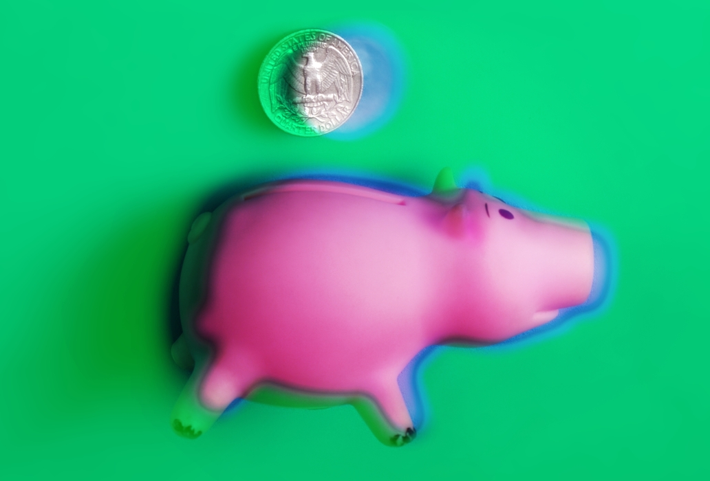 Piggy Bank and Twenty Five Cent Quarter