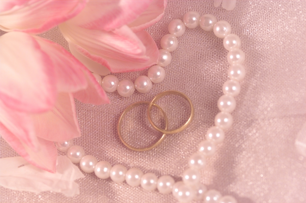 The Wedding Day:  Wedding Rings with Pearl Heart and Flowers