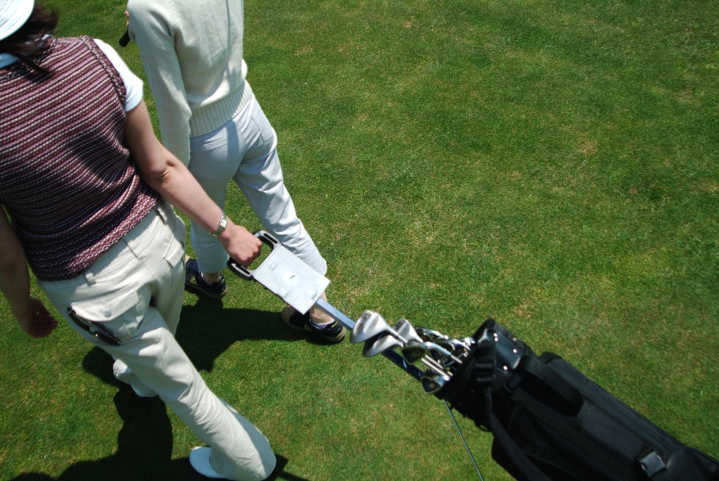 Female Golfers Walking to The Next Hole